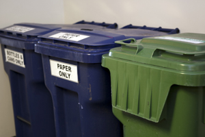 Three recycling bins